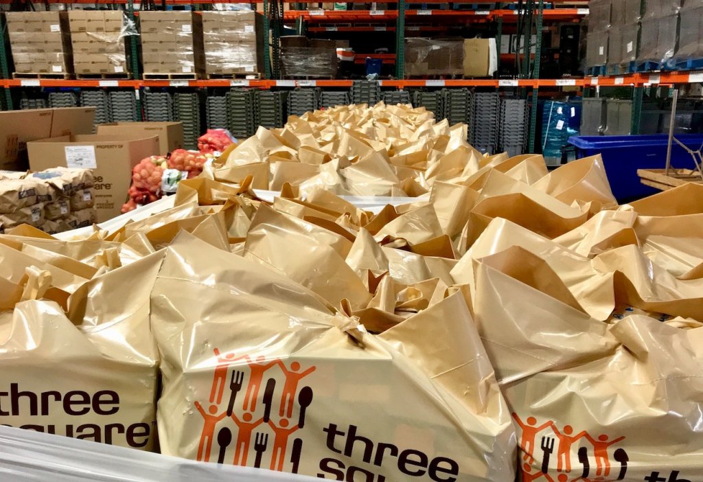 bags of food ready for distribution