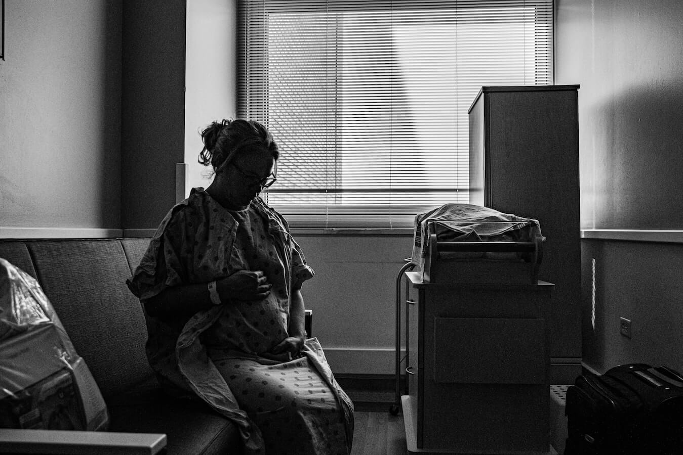 pregnant woman in hospital gown